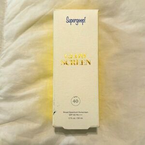 A lightweight super goop sunscreen glow lotion that’s brand new store bought